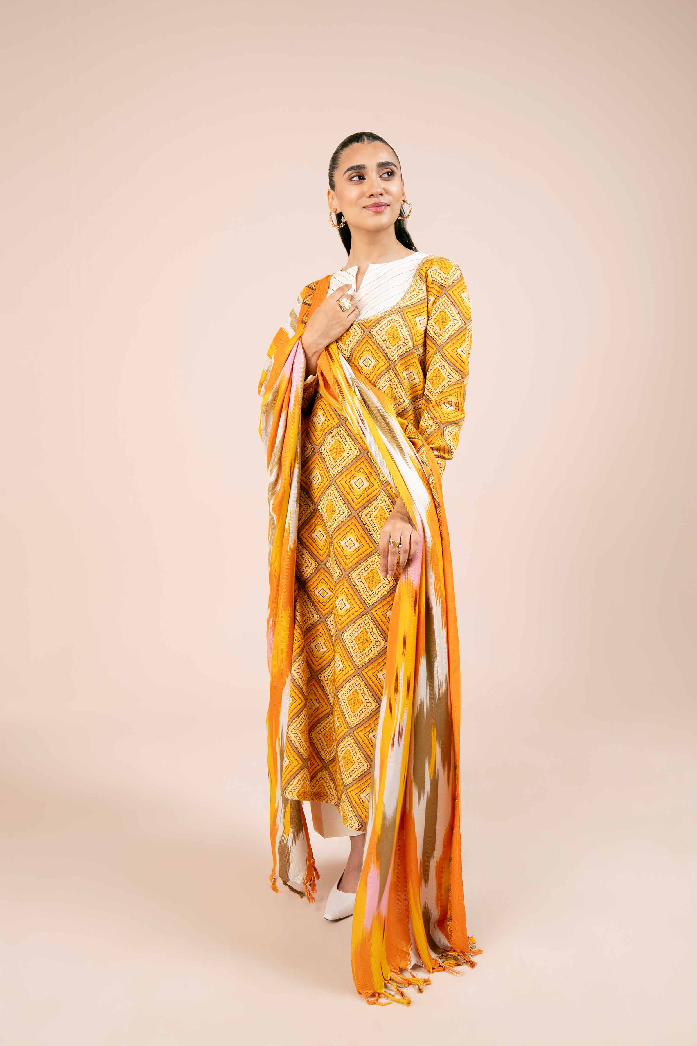 NishatUK - Orange Printed Khaddar 3-piece unstitched Suit